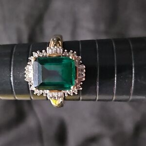 Vintage 10 carat gold with diamond accents and a huge created emerald cen